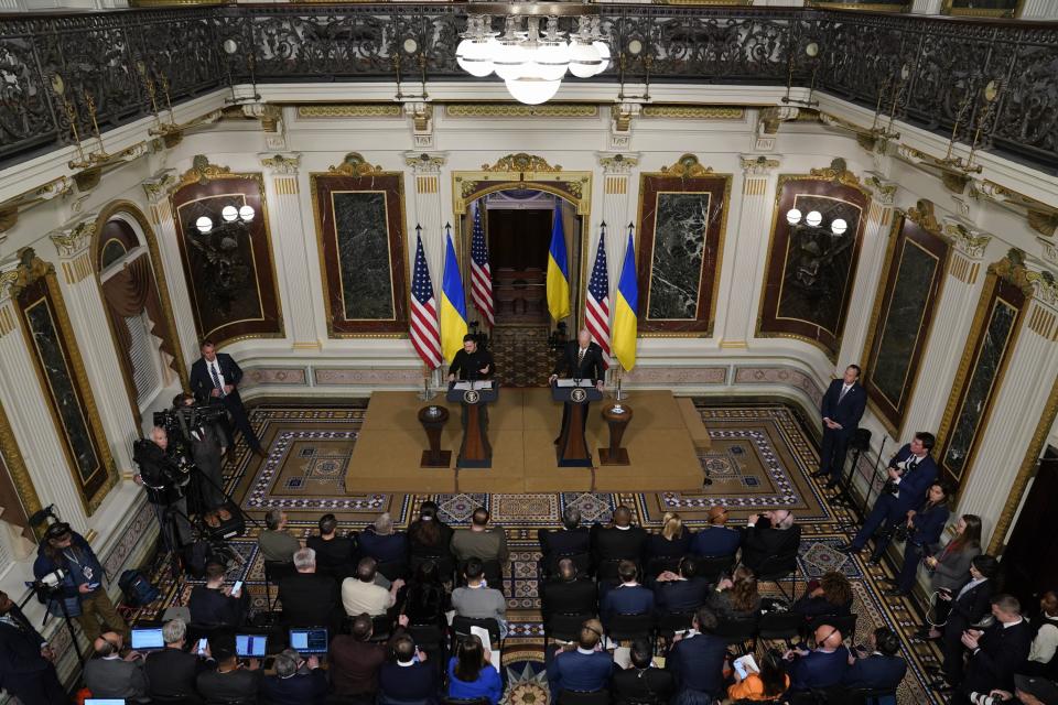 President Joe Biden and Ukrainian President Volodymyr Zelenskyy hold a news conference in the Indian Treaty Room in the Eisenhower Executive Office Building on the White House Campus, Tuesday, Dec. 12, 2023, in Washington.