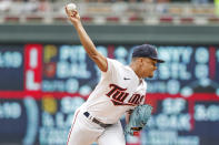 Minnesota Twins starting pitcher Chris Archer throws to the Toronto Blue Jays in the first inning of a baseball game Sunday, Aug. 7, 2022, in Minneapolis. (AP Photo/Bruce Kluckhohn)