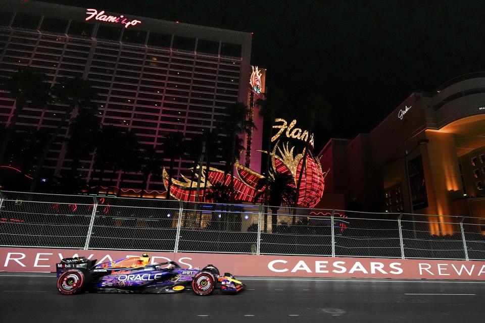 Red Bull driver Sergio Perez, of Mexico, takes part in the final practice session for the Formula One Las Vegas Grand Prix auto race, Friday, Nov. 17, 2023, in Las Vegas. (AP Photo/Nick Didlick)