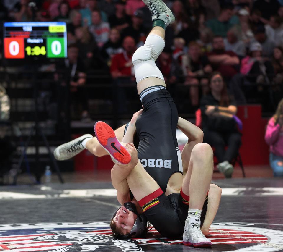 Collin Miller, Skyview, competes with eventual winner Gale Harman, Mountain View, in 132 pounds in the 4A boys wrestling state championships at UVU in Orem on Saturday, Feb. 17, 2024. | Jeffrey D. Allred, Deseret News