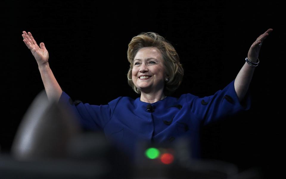 Former Secretary of State Hillary Rodham Clinton gestures before delivering the keynote address at Marketo’s 2014 Marketing Nation Summit Tuesday, April 8, 2014, in San Francisco. (AP Photo/Ben Margot)