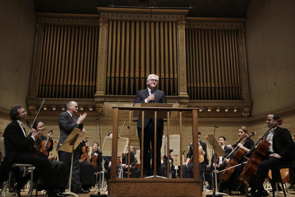 German President Frank-Walter Steinmeier speaks before a joint concert of the Boston Symphony Orchestra and Germany's visiting Leipzig Gewandhaus Orchestra, Thursday, Oct. 31, 2019, at Symphony Hall in Boston. (AP Photo/Elise Amendola)