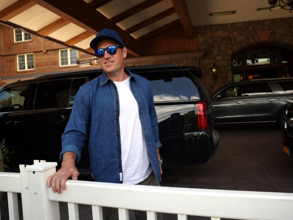 Joey Levin standing at fence outside Sun Valley Lodge