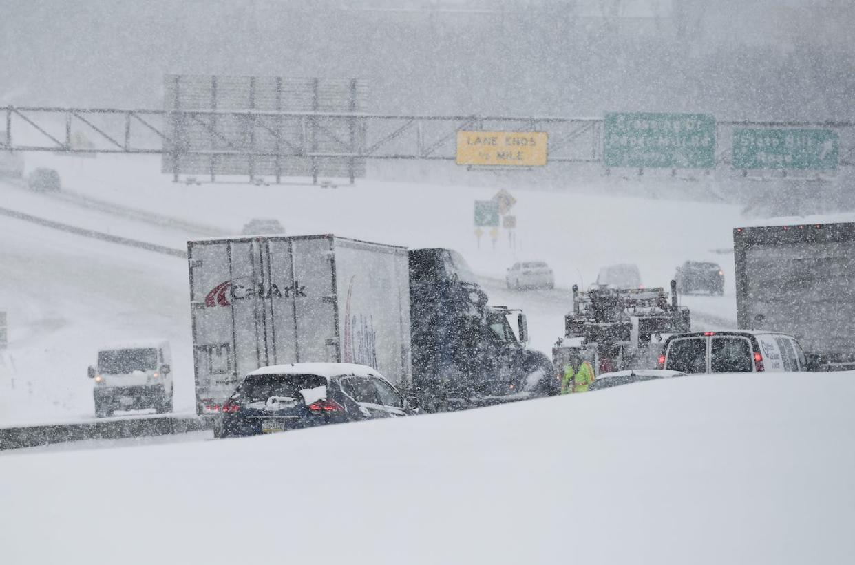 Wrecks during snowstorms can shut down highways, stranding drivers in the cold for hours. <a href="https://www.gettyimages.com/detail/news-photo/wyomissing-pa-a-tow-truck-works-on-freeing-a-stuck-tractor-news-photo/1303555959" rel="nofollow noopener" target="_blank" data-ylk="slk:Ben Hasty/MediaNews Group/Reading Eagle via Getty Images;elm:context_link;itc:0;sec:content-canvas" class="link ">Ben Hasty/MediaNews Group/Reading Eagle via Getty Images</a>