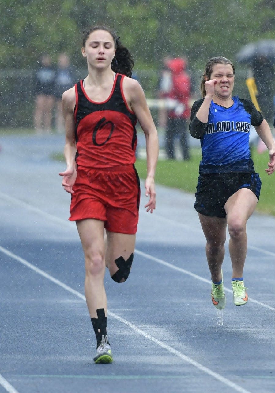 Onaway's Madilyn Crull (left) finished first in all four events she competed in on Wednesday.