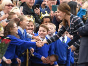 <p>Catherine, Duchess of Cambridge, greets excited school children as she leaves a reception at the National Football Museum on Oct. 14, 2016 in Manchester, England. (Photo by Karwai Tang/WireImage) </p>