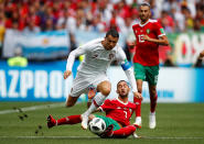 <p>Cristiano Ronaldo powers past Morocco’s Hakim Ziyech </p>