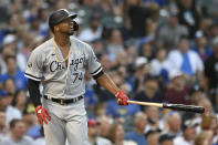 Chicago White Sox's Eloy Jimenez watches his two-run home run during the first inning of a baseball game against the Chicago Cubs Sunday, Aug 8, 2021, at Wrigley Field in Chicago. (AP Photo/Paul Beaty)