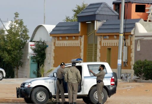 Saudi security personnel on patrol in al-Munissiyah district, north-east of Riyadh, during a search for Al-Qaeda terror suspects in 2006. Saudi authorities say they have arrested two Saudis and six Yemenis who were "in contact with the deviant organisation abroad," a term usually used to refer to the Al-Qaeda jihadist network