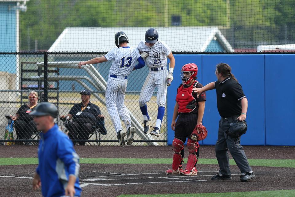 Chapel Field's Mike Bonagura celebrates scoring the go-ahead run with teammate Noah Swart in the NYSPHSAA Class D baseball championship game, Saturday, June 10, 2023, at Maine-Endwell High School.