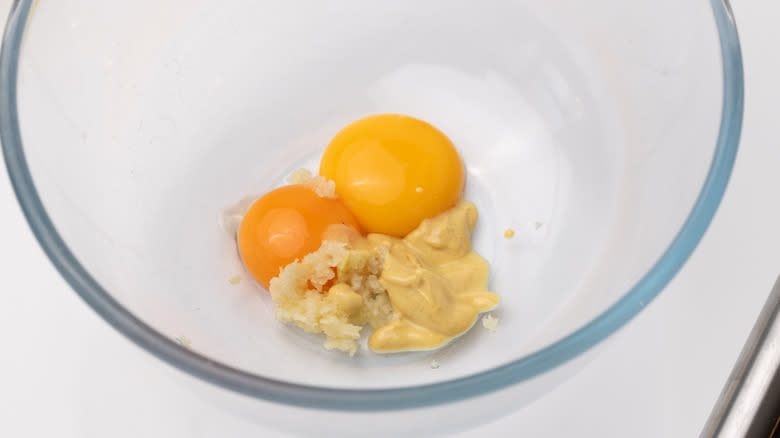 egg yolks and crushed garlic