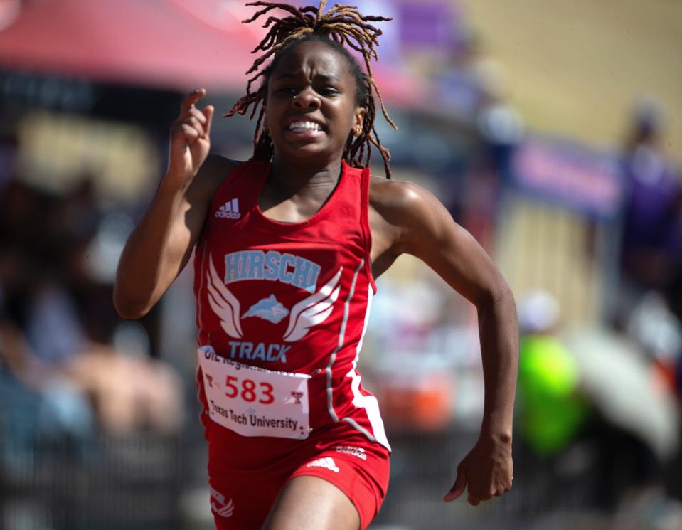 Hirschi's Ashton Carter competes in the 200 meter dash during the Region I-4A track and field meet, Saturday, April 30, 2022, at Lowrey Field at PlainsCapital Park.