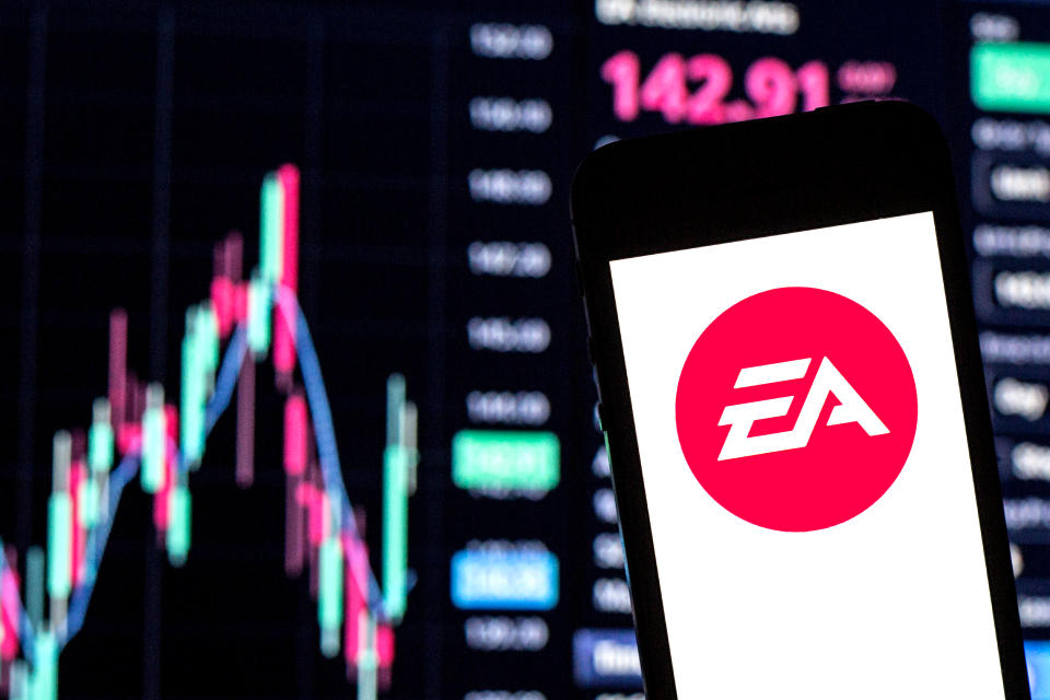 In this photo illustration an Electronic Arts Inc. logo seen displayed on a smartphone with the stock market information of Electronic Arts Inc in the background. (Photo: Illustration by Thiago Prudêncio/SOPA Images/LightRocket via Getty Images)