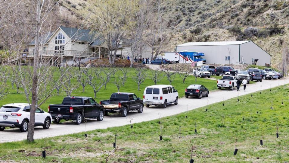 Supporters of Ammon Bundy gather at his property in Emmett, Monday, April 24, 2023, after they were told his arrest was imminent.