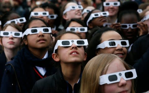 School Children eclipse - Credit: Reuters