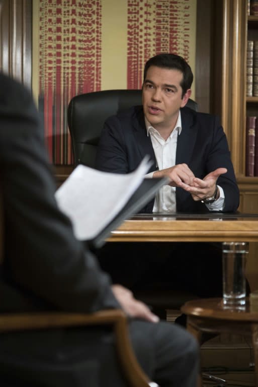 Greece's Prime Minister Alexis Tsipras speaks during an interview with ERT state TV, on July 14, 2015