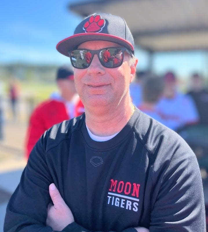 New Moon Tigers' head coach Rich Rowe looks on during Moon's trip to the Ripken Experience in Myrtle Beach, SC.