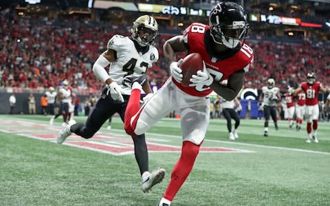  Atlanta Falcons wide receiver Calvin Ridley (18) catches a touchdown pass against the New Orleans Saints defensive back Marcus Williams (43) in the third quarter at Mercedes-Benz Stadium - Credit: (Jason Getz/USA Today)