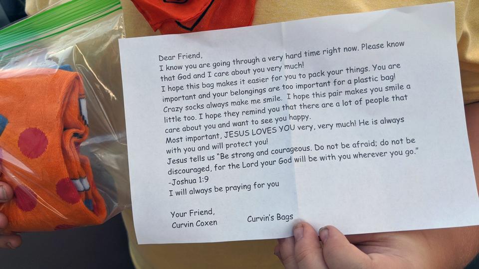 A letter enclosed in with the gift bag offers encouragement to children moved from their homes.