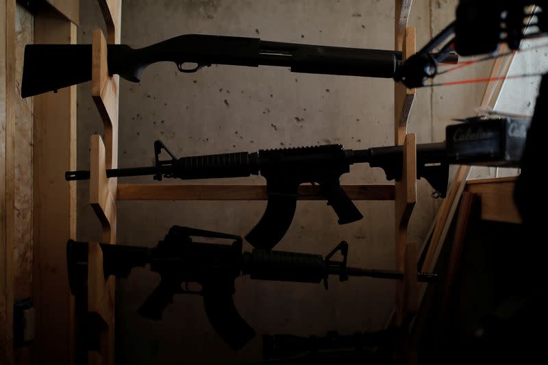 A weapons cache in the basement of a survival camp