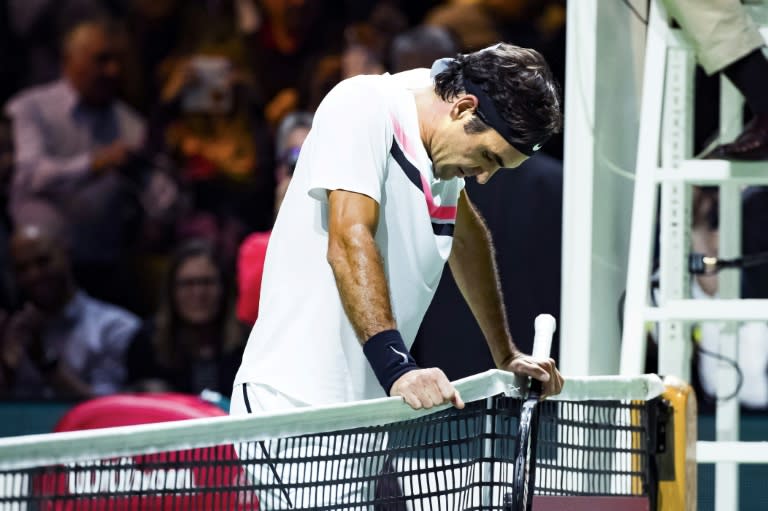 Net gain: Roger Federer takes a breather after seeing off Andreas Seppi to reach the Rotterdam final on Saturday