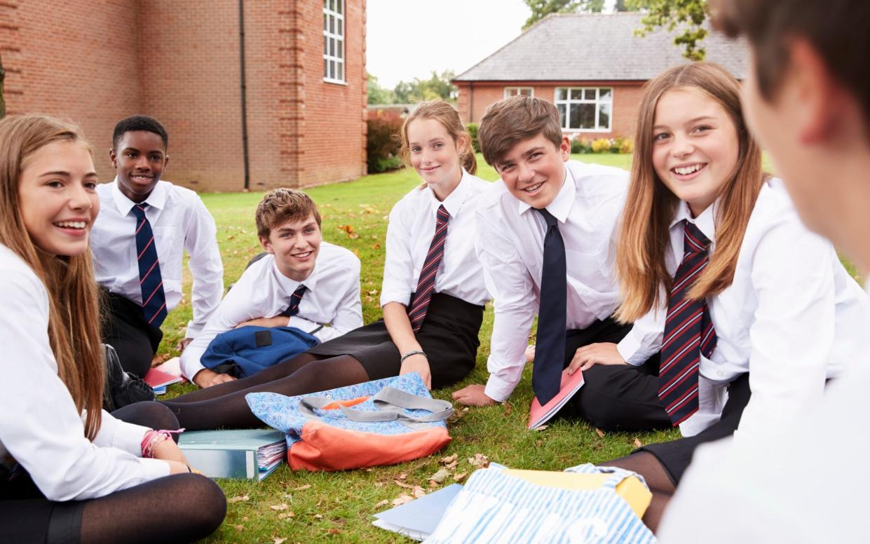 School pupils studying outdoors