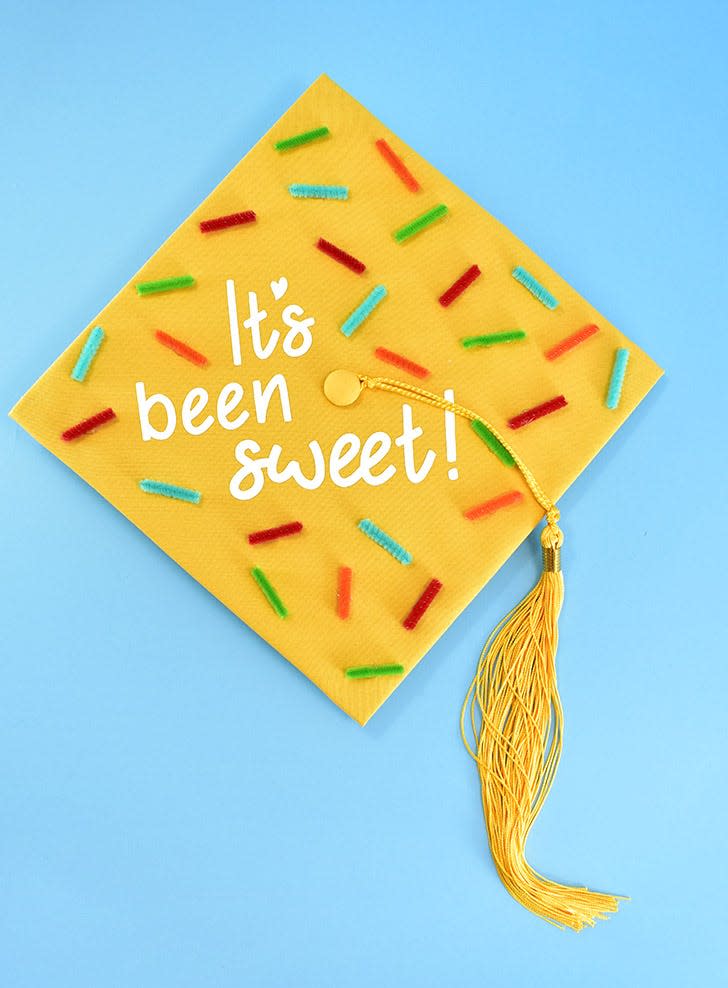 <p>You might just look as if you’ve been dipped in ice cream and sprinkles with the help of this delightful cap!</p><p><strong>Get the tutorial at <a href="https://www.dreamalittlebigger.com/post/diy-graduation-caps.html" rel="nofollow noopener" target="_blank" data-ylk="slk:Dream a Little Bigger;elm:context_link;itc:0;sec:content-canvas" class="link ">Dream a Little Bigger</a>.</strong></p>