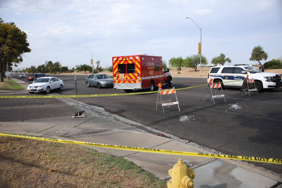 Police vehicles block traffic at the scene of an accident between North 43th Avenue and West Thunderbird Road in Phoenix on July 22, 2022.