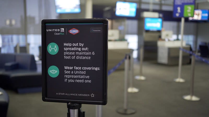 Signage with the United Airlines logo next to the Clorox logo