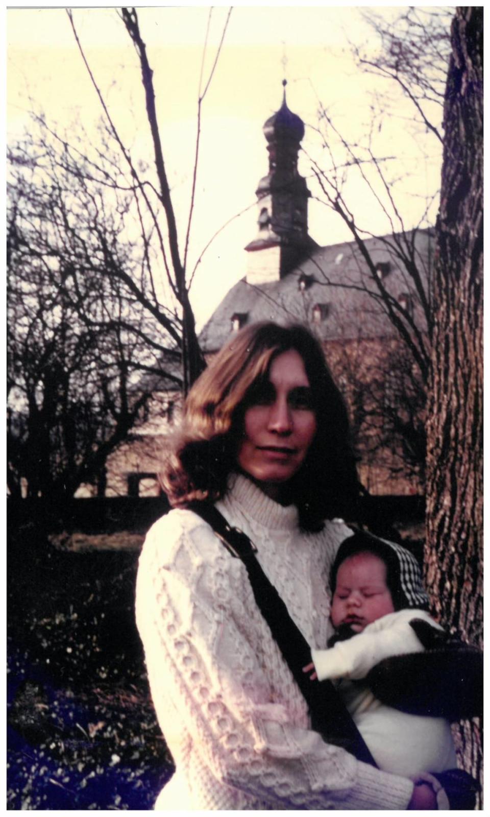 Patricia Peterson holding Clayton Peterson in Rockenberg, Germany in 1974