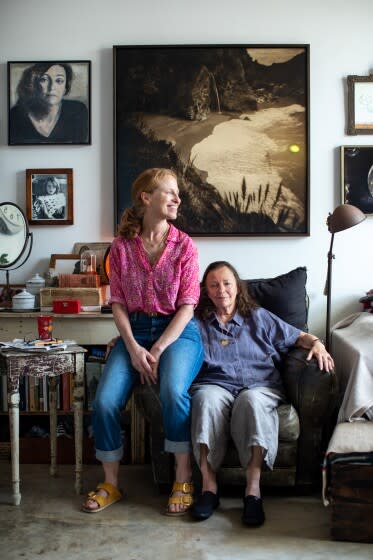 Venice, CA - August 01:Award-winning author Marianne Wiggins, right, is photographed with her daughter, photographer Lara Porzak, in the home they have shared since WIggins' stroke in 2016, in Venice, CA, Monday, Aug. 1, 2022. Following her stroke, Wiggins moved into her daughter's Venice home and together they finished Wiggins' lastest novel, "Properties of Thirst." (Jay L. Clendenin / Los Angeles Times)