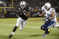 Darren McFadden #20 of the Oakland Raiders catches a short pass and carries it to the two yard line in the second quarter of the season opener against the San Diego Chargers at Oakland-Alameda County Coliseum on September 10, 2012 in Oakland, California. (Photo by Thearon W. Henderson/Getty Images)