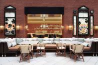 <p>Located in Tribeca's new Hotel Barrière Fouquet's New York, <a href="https://www.hotelsbarriere.com/en/collection-fouquets/new-york/restaurants-and-bars/par-ici-cafe.html" rel="nofollow noopener" target="_blank" data-ylk="slk:Par Ici Cafe;elm:context_link;itc:0;sec:content-canvas" class="link ">Par Ici Cafe</a> serves local, organic, and mostly vegetarian fare for breakfast and lunch in its scenic courtyard space, topped with a retractable roof. Breakfast musts include orange brioche French toast, can't-miss croissants, and an omelet with Gruyere and herbs, and lunch offerings skew Mediterranean, with roasted harissa carrots, fattoush salad, and a spicy feta dip. (Indulge in some international culinary travel, however, and order churros for dessert.)</p>