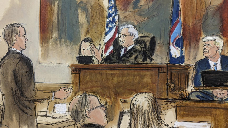 In this courtroom sketch, Judge Arthur Engoron, center, speaks to former President Donald Trump's attorney, Chris Kise, left, directing him to speak with Trump, far right, to answer the questions by the assistant attorney general in New York Supreme Court, Monday, Nov. 6, 2023, in New York. (Elizabeth Williams via AP)