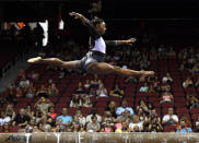 Simone Biles performs her balance beam routine during the GK US Classic gymnastics meet in Louisville, Ky., Saturday, July 20, 2019. (AP Photo/Timothy D. Easley)