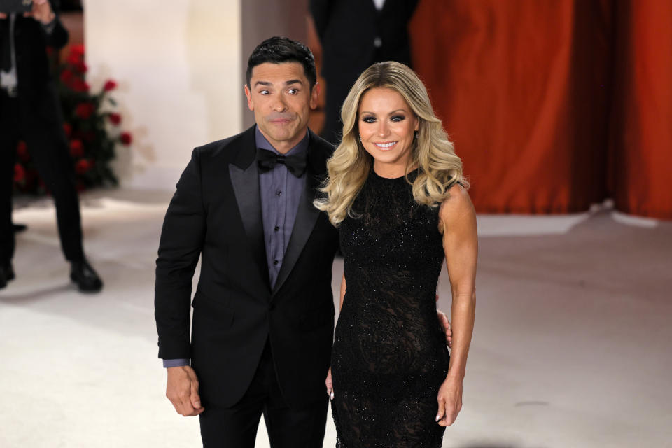 Mark Consuelos and Kelly Ripa attend the Oscars