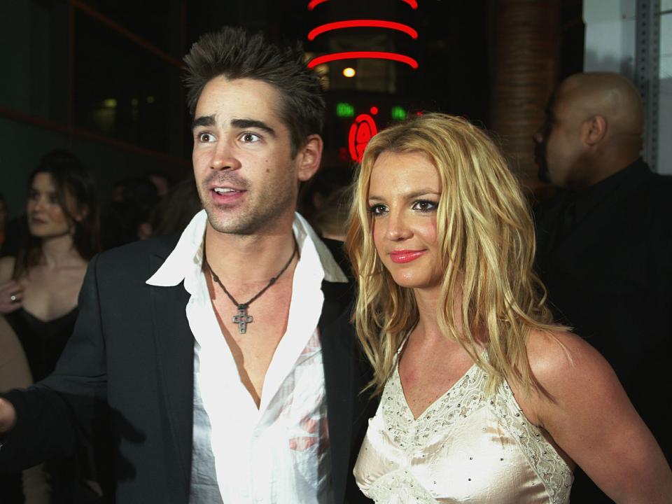 Singer Britney Spears and actor Colin Farrell arrive at the premiere of "The Recruit" at the Cinerama Dome on January 28, 2003 in Hollywood, California