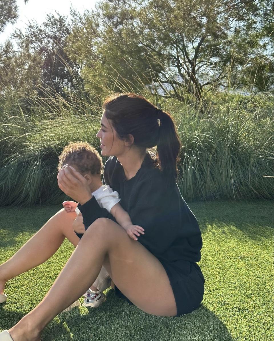 Kylie Jenner plays with her son