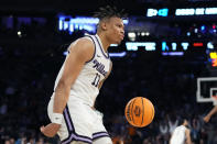 Kansas State forward Keyontae Johnson reacts after a dunk in overtime of a Sweet 16 college basketball game against Michigan State in the East Regional of the NCAA tournament at Madison Square Garden, Thursday, March 23, 2023, in New York. (AP Photo/Frank Franklin II)