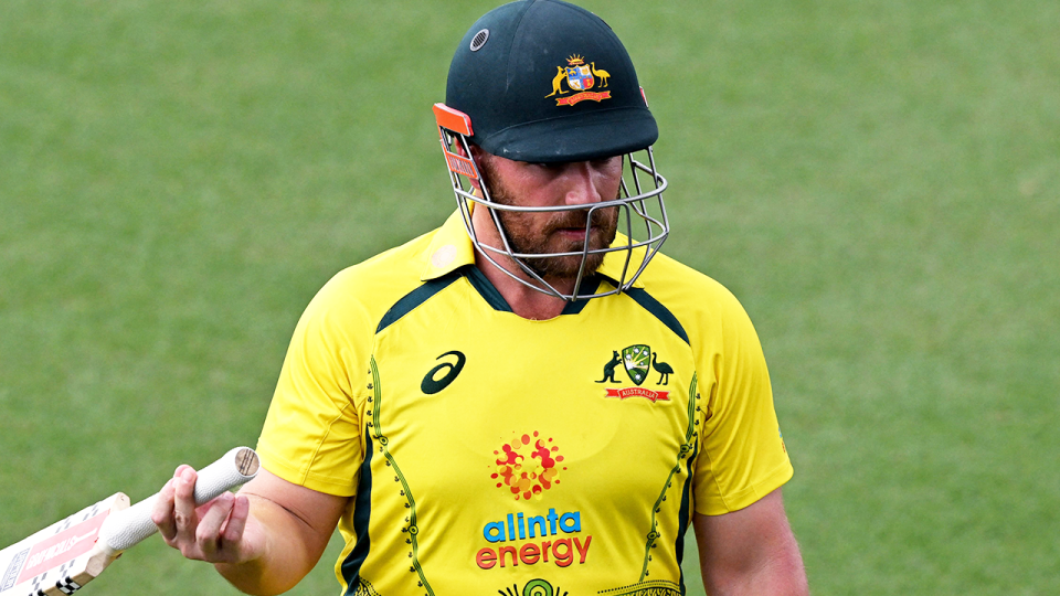 Captain Aaron Finch (pictured) walking off after being dismissed.