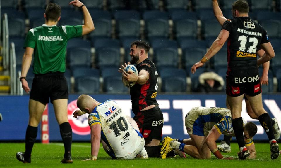 <span>Alex Walmsley celebrates after Saints’ third try.</span><span>Photograph: Martin Rickett/PA</span>