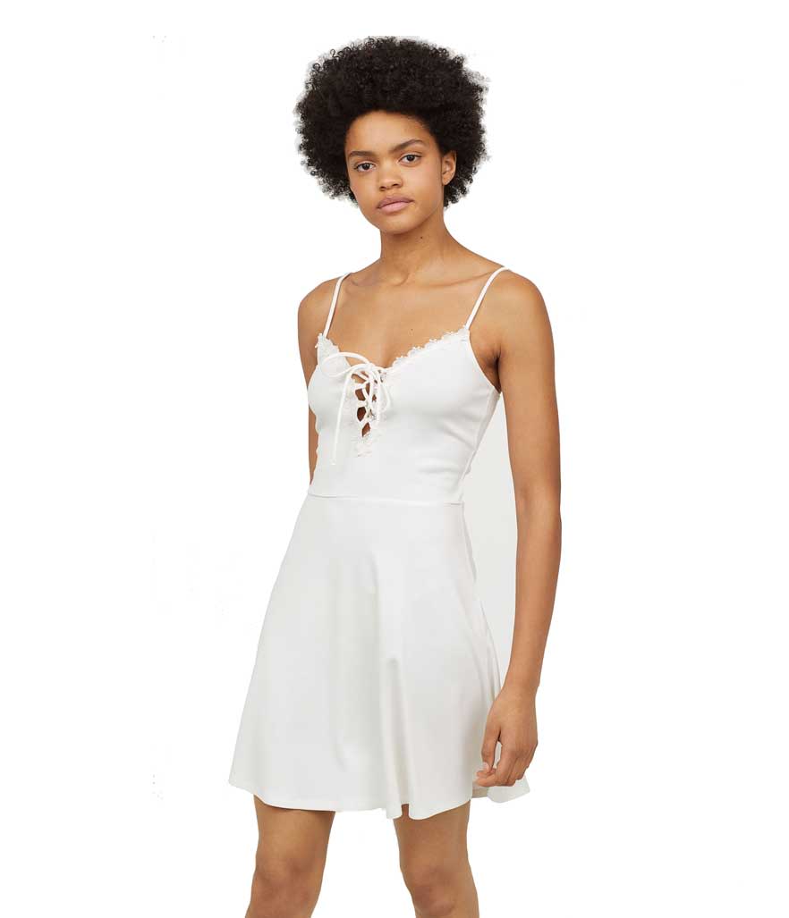White lace-up dress with lace detail. (Photo: H&M)