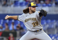 Milwaukee Brewers pitcher Corbin Burnes throws during the first inning of the team's baseball game against the Miami Marlins, Friday, May 13, 2022, in Miami. (AP Photo/Jim Rassol)