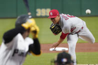 St. Louis Cardinals starter Jose Quintana, right, pitches to Pittsburgh Pirates' Ke'Bryan Hayes, left, during the first inning of a baseball game, Monday, Oct. 3, 2022, in Pittsburgh. (AP Photo/Keith Srakocic)
