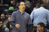 Marquette head coach Shaka Smart shouts during the first half of an NCAA college basketball game against Villanova, Wednesday, Jan. 19, 2022, in Villanova, Pa. (AP Photo/Laurence Kesterson)