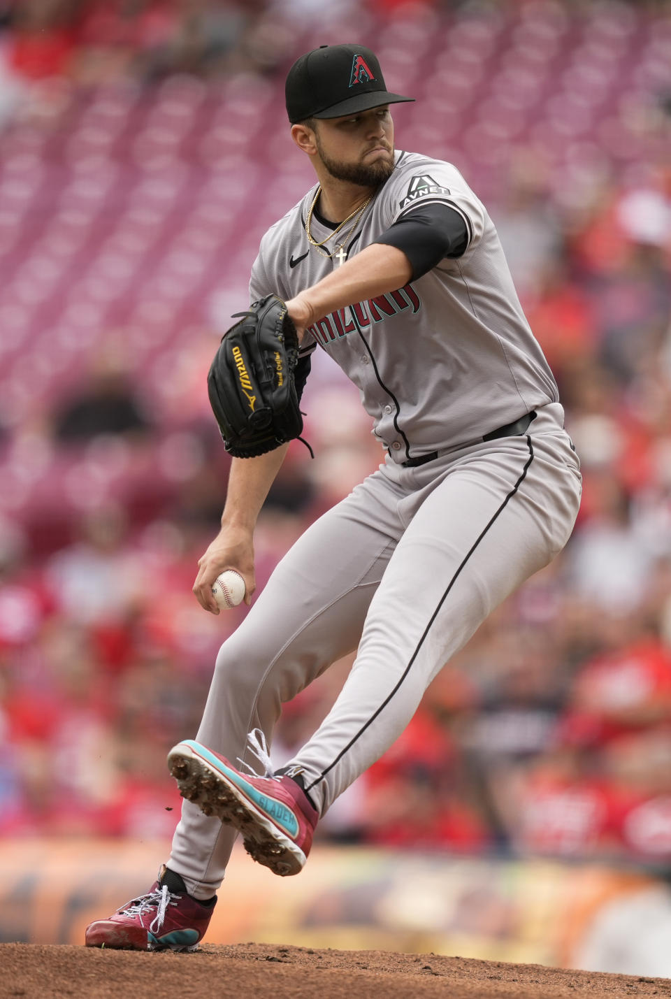 Arizona Diamondbacks starting pitcher Slade Cecconi throws in the first inning of a baseball game against the Cincinnati Reds on Thursday, May 9, 2024, in Cincinnati. (AP Photo/Carolyn Kaster)