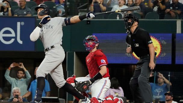 PHOTO: New York Yankees' Aaron Judge hits a solo home, his 62nd of the season, in Arlington, Texas, Oct. 4, 2022. (Lm Otero/AP)