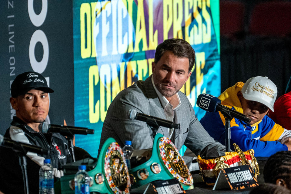 Juan Estrada (left), Eddie Hearn, chairman of Matchroom Sport and Professional Darts Corporation, center, and Roman "Chocolatito" Gonzalez (right), attend a press conference for a Dec. 3 boxing match at the Desert Diamond Arena in Glendale on Dec. 1, 2022.