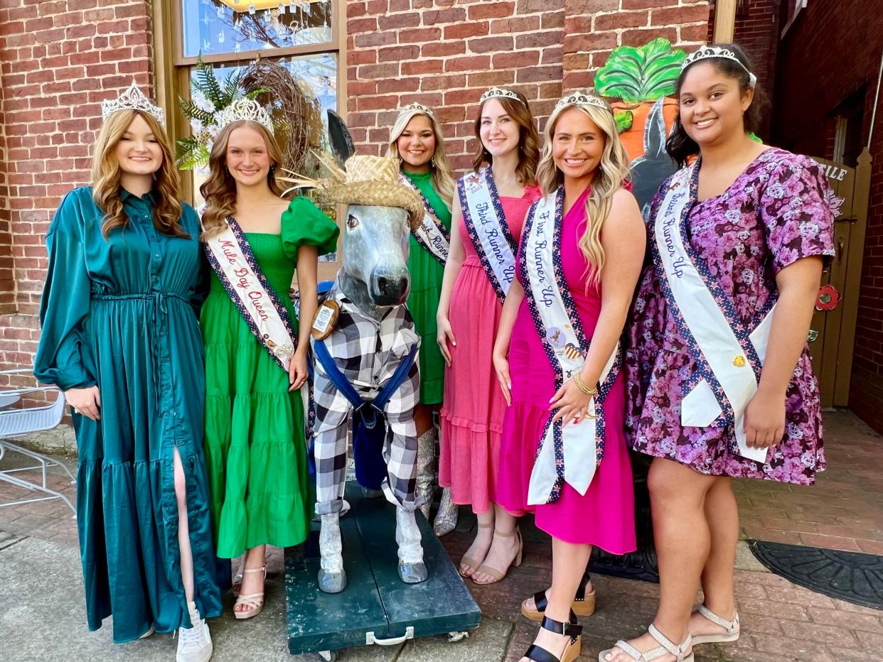 From left, the 2024 Mule Day Queen's court includes honorary Queen Carly McGee, Mule Day Queen Anissa Grimes, Fourth Runner-up Ava Sykes, Third Runner-up Shae Klament, First Runner-up Kennedy Bragg and Second Runner Up Graciee English stand at Baxter's Mercantile.