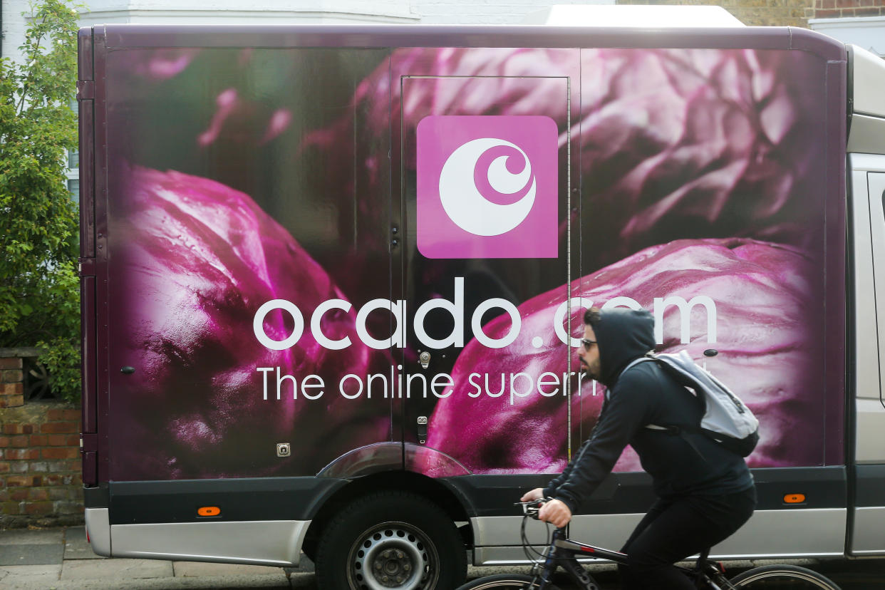 LONDON, UNITED KINGDOM - 2020/06/12: A cyclist rides past an Ocado delivery van. (Photo by Dinendra Haria/SOPA Images/LightRocket via Getty Images)